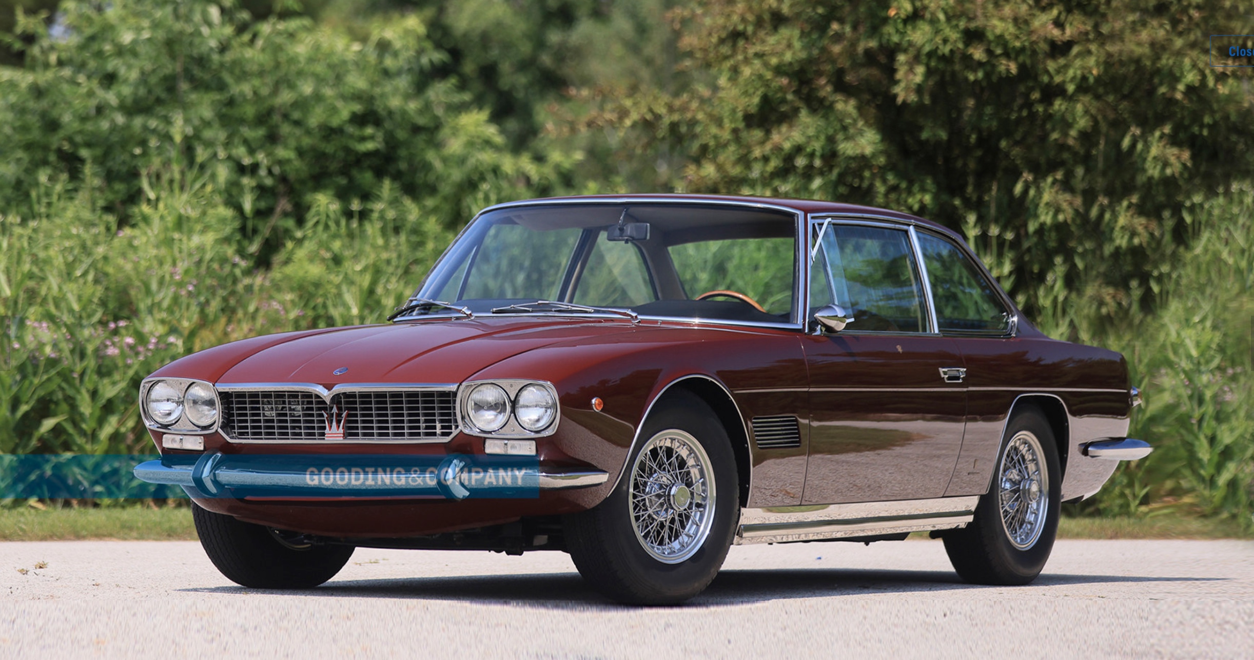 Burgundy Maserati Mexico left front view